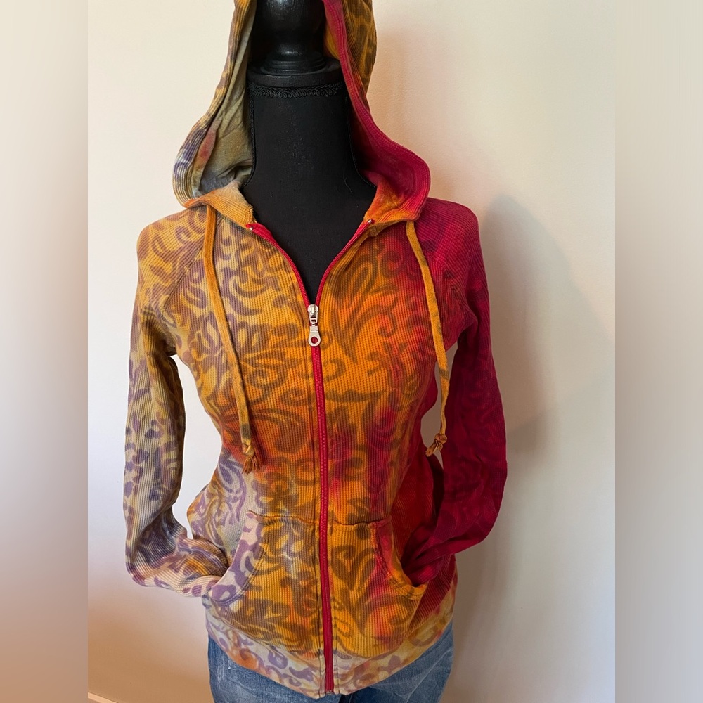 Cream Soda light weight hoodie.Purple, red, orange. Full zip. Like new. Small.
